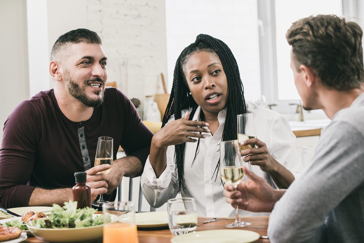 Neighbors having champagne together.