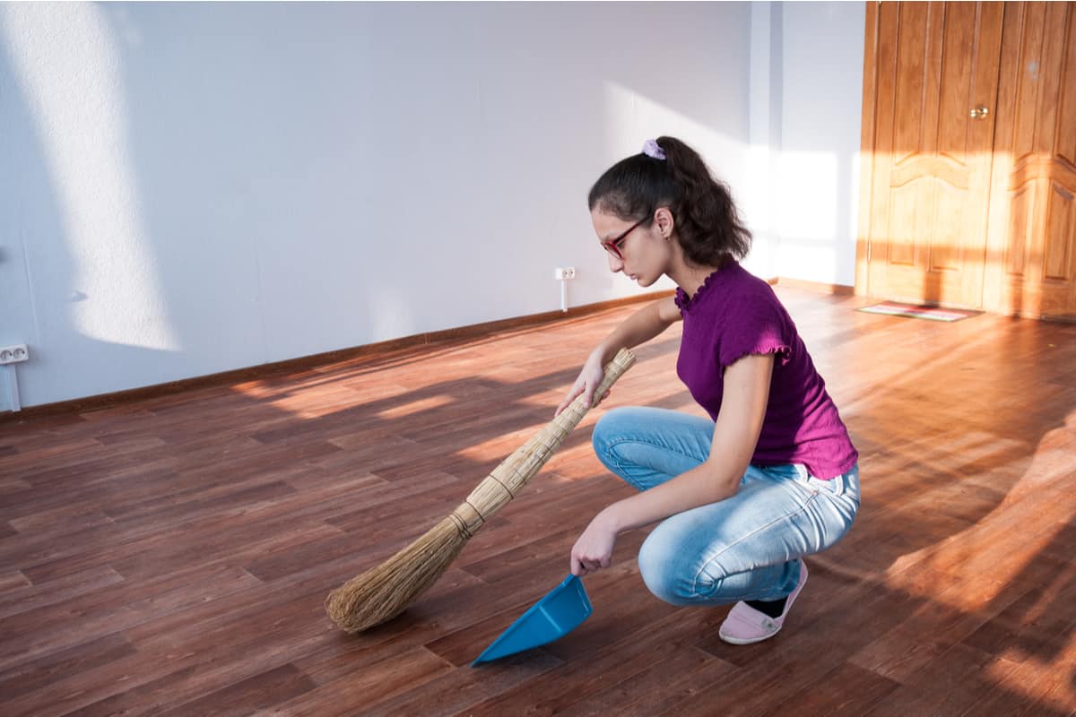Sweeping an empty apartment.